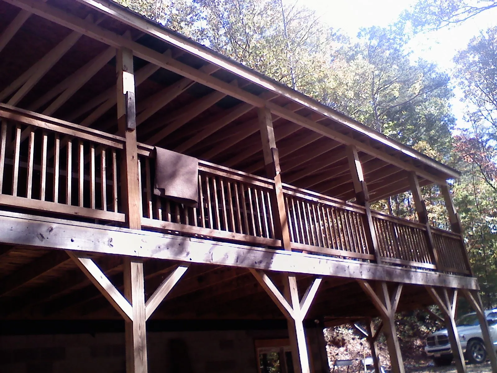 Timber framing under a new elevated porch and deck — Roof Leak Repair in Mebane by Roofing Brothers